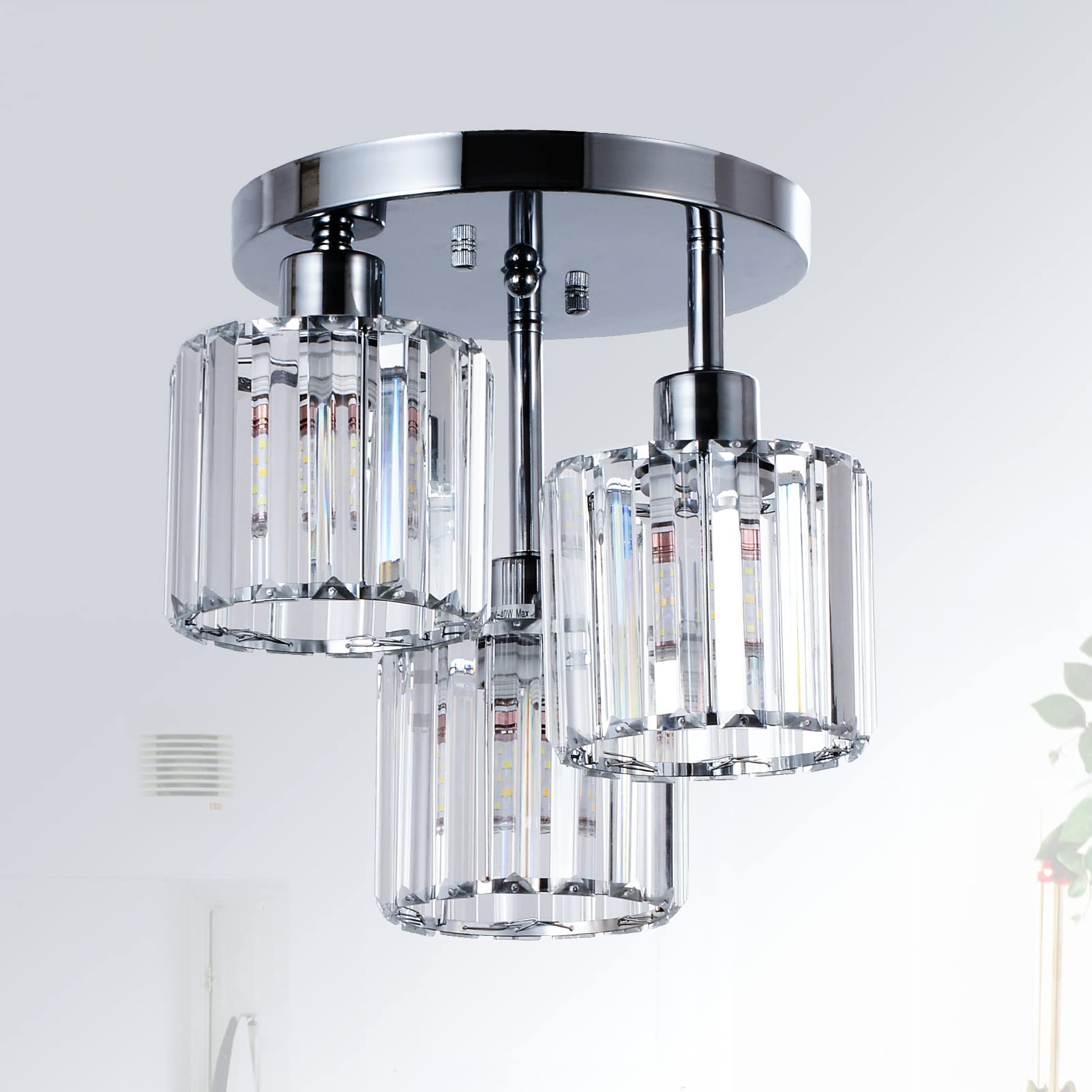 PAUFUL three-light semi-flush mount with crystal shades adds elegant sparkle to kitchens.