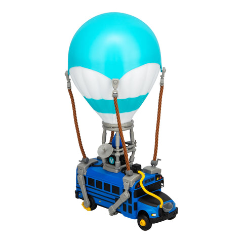 Paladone Fortnite Battle Bus light on desk with immersive ambient glow.