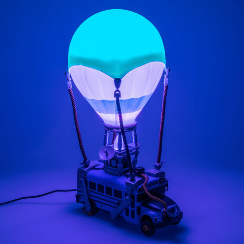 Paladone Fortnite Battle Bus lamp powered via USB for easy setup.