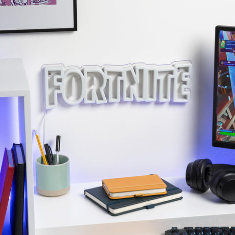 Paladone Fortnite logo light in bedroom decor for stylish ambiance.
