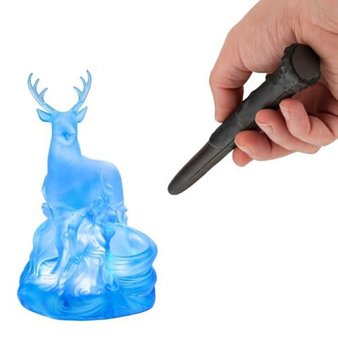 The 18 cm tall Deer Patronus Light on a bedside table