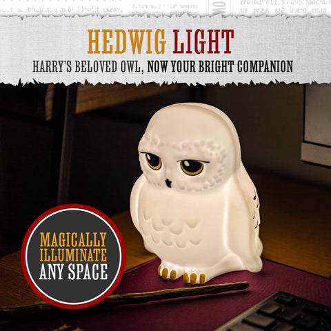 Paladone Hedwig owl light adds cozy glow to bedroom decor.