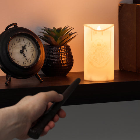 Close-up of Paladone Hogwarts crest LED candle showing authentic details