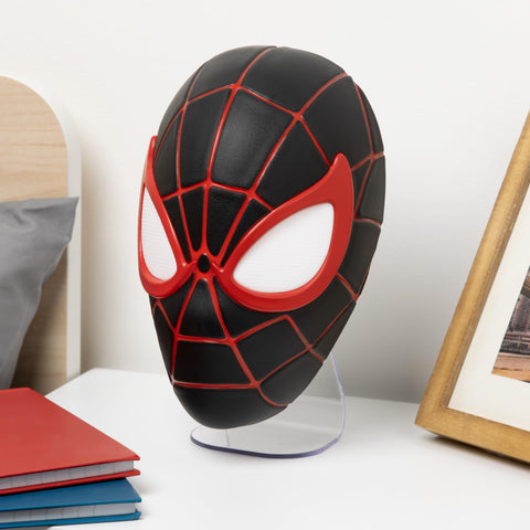 Paladone Miles Morales mask LED light standing on a desk for hero-ready ambiance