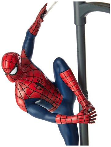 Paladone Spiderman desk lamp in a streetlamp pose adds dramatic lighting to your desk.