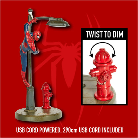 Paladone Spiderman lit desk lamp provides ambient glow for late-night study.