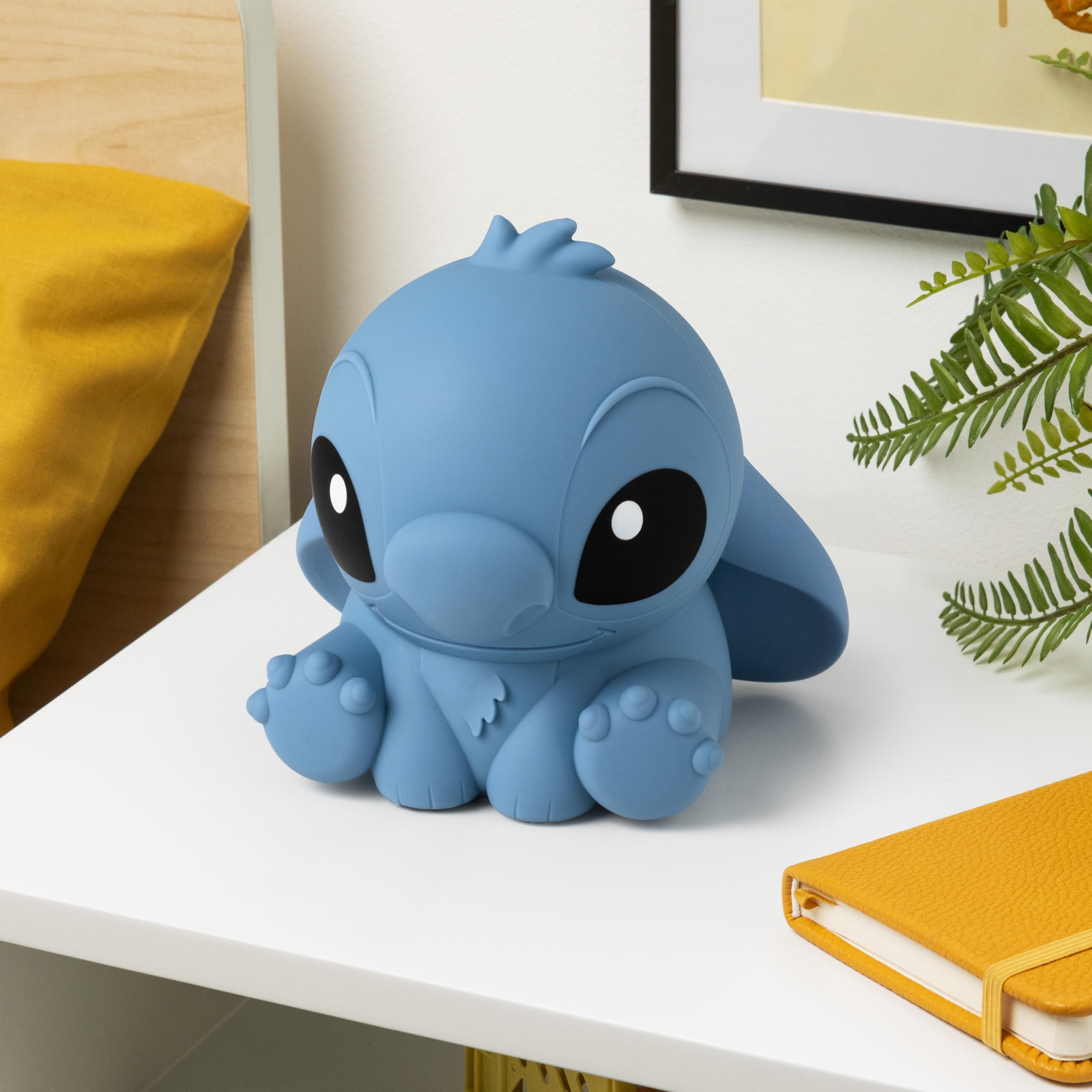 Paladone Stitch squishy lamp shows three brightness settings for customizable ambiance