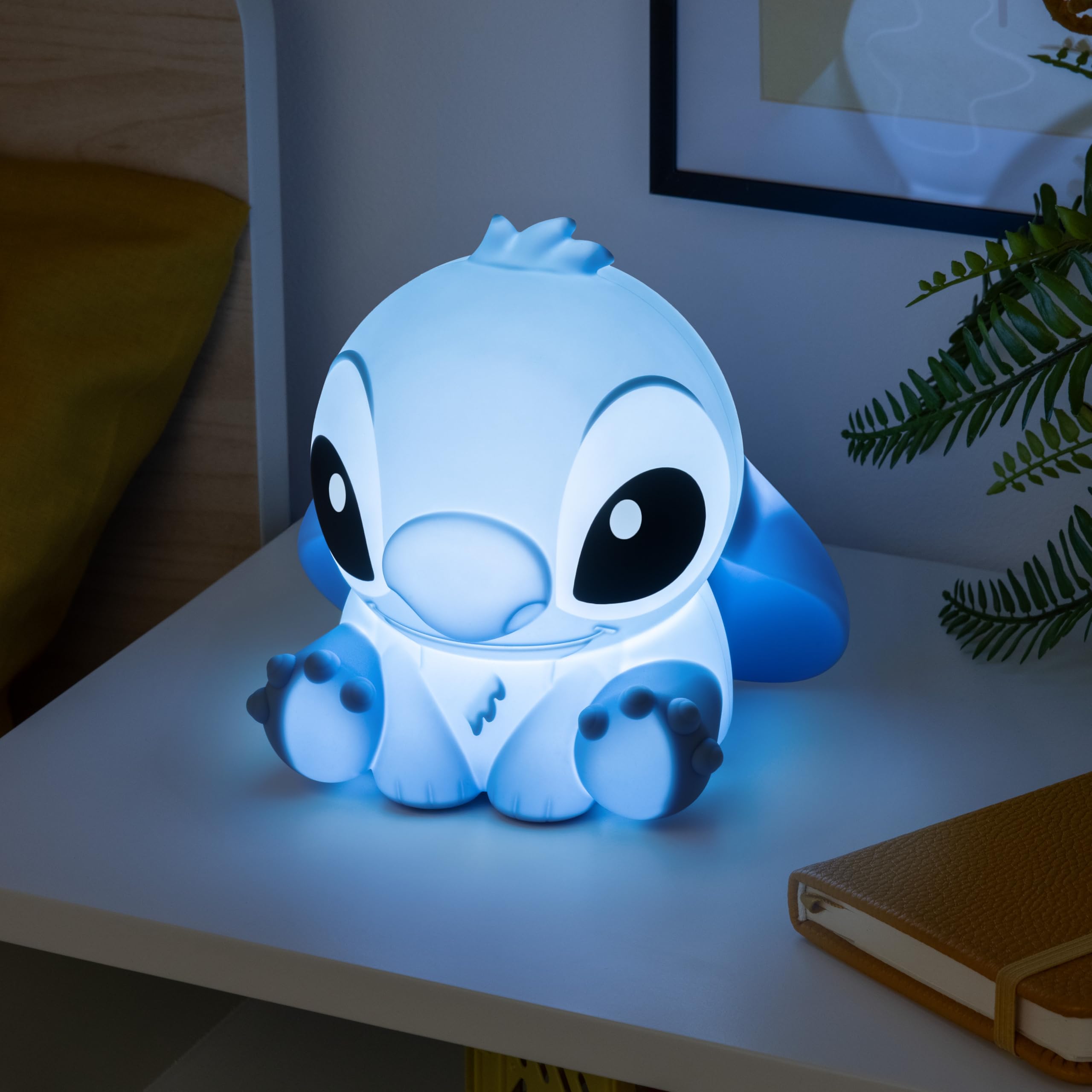 Paladone Stitch squishy lamp hugged by a child, tactile, kid-friendly design