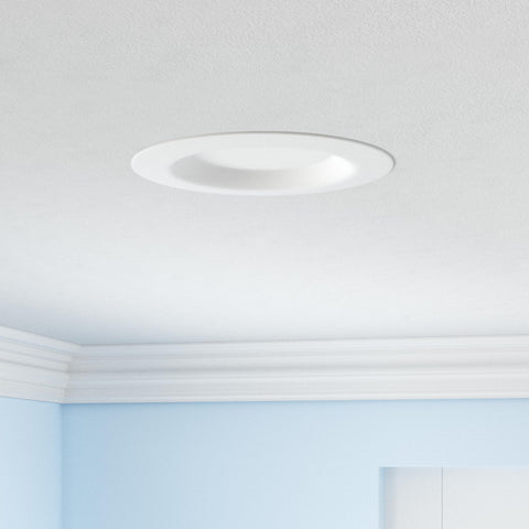 Parmida teeth-grip installation ensures secure retrofit into existing 5-6 inch housings.