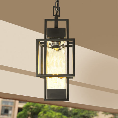 PARTPHONER dark metal cage pendant in damp-location setting for exterior and interior uses.
