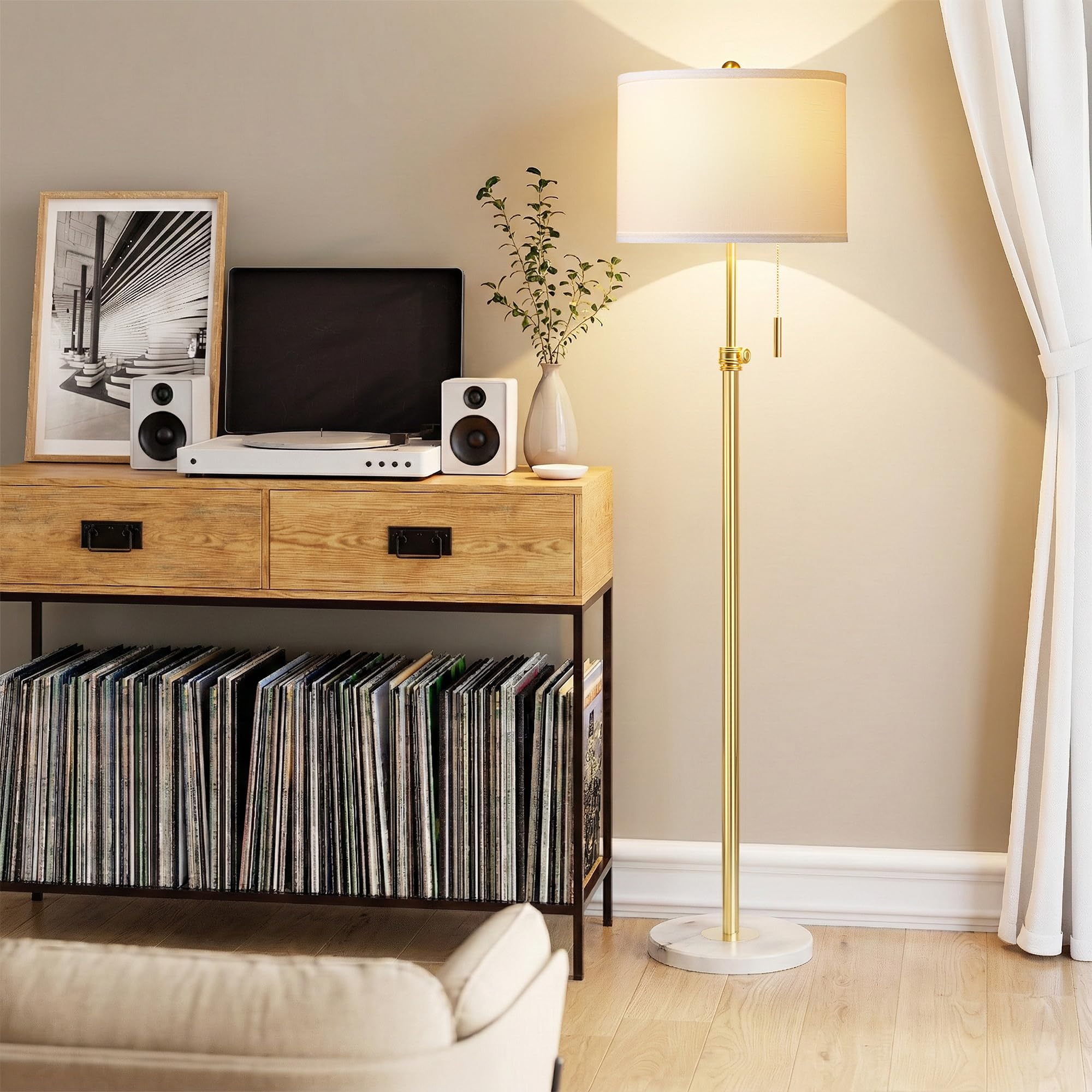 PARTPHONER height-adjustable lamp adapts to seating and reading angles.