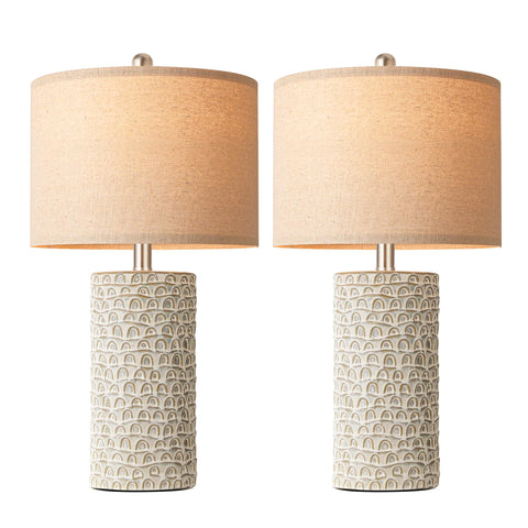 PARTPHONER paired lamps on a console table create balanced symmetry.