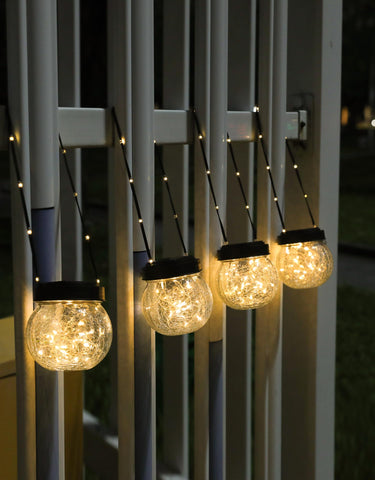 PARTPHONER solar lantern cracked-glass hanging globe provides steady twilight glow.