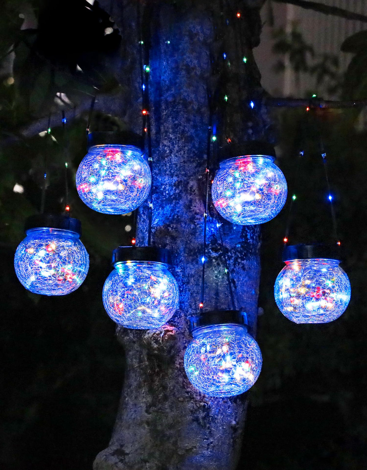PARTPHONER solar lantern with cracked glass glows warmly for outdoor evenings.
