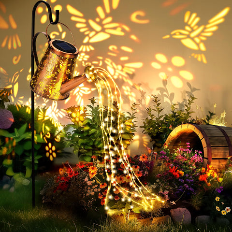 PATIOPIA solar watering-can lantern lights garden paths at dusk