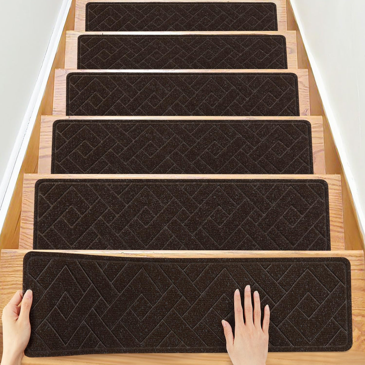 PATTENGO stair treads on wooden stairs with quick, tool-free installation.