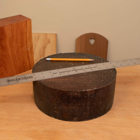 Peachtree ruler on a wood board enables quick centering without math.