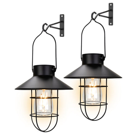 Pearlstar metal lantern hanging in a garden adds ambient warm light.