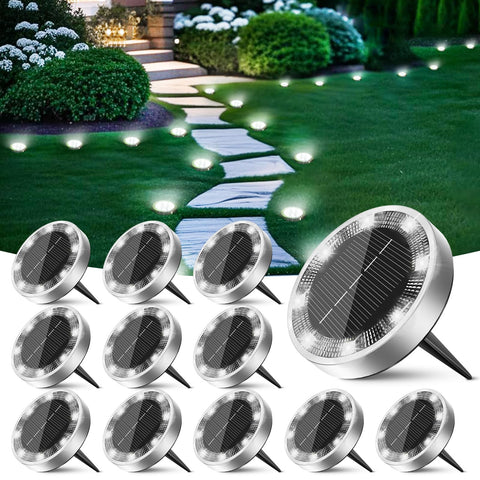Peasur mini solar ground light pack 1 lights a garden path at night.
