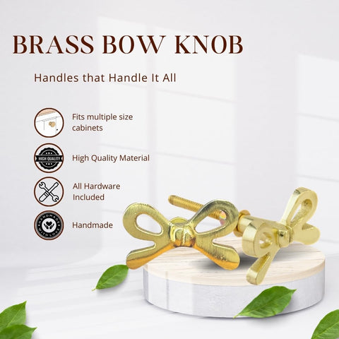 Close-up of Perilla Home brass bow knob showing a refined satin finish
