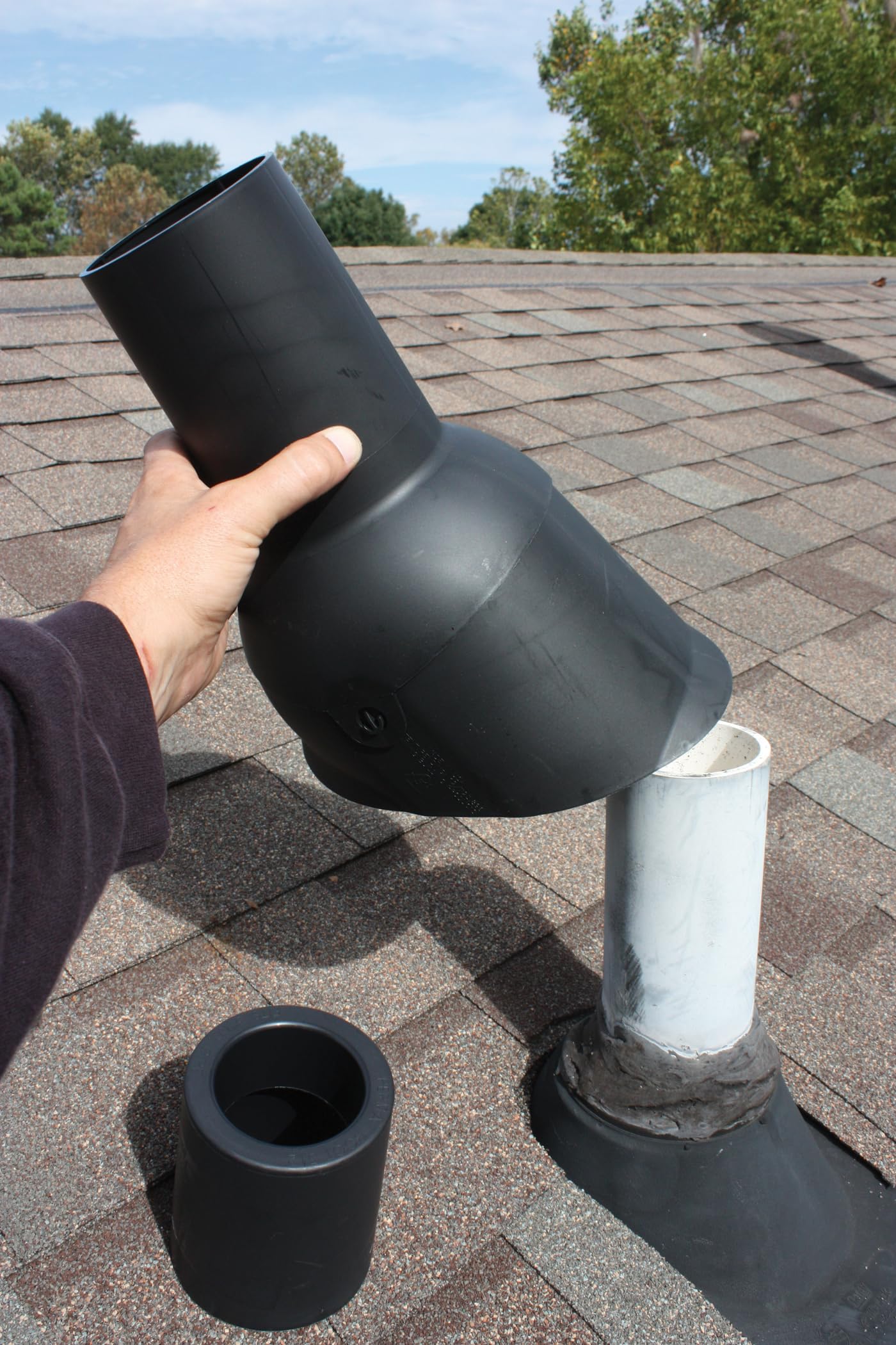 Perma-Boot vent pipe connection demonstrates secure, weatherproof seal around a vent.
