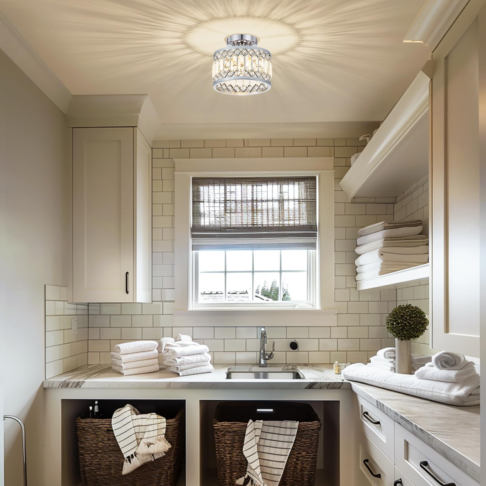 Pevfah crystal chrome ceiling light dimmed to create ambient glow