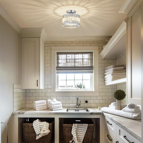 Pevfah crystal chrome ceiling light dimmed to create ambient glow