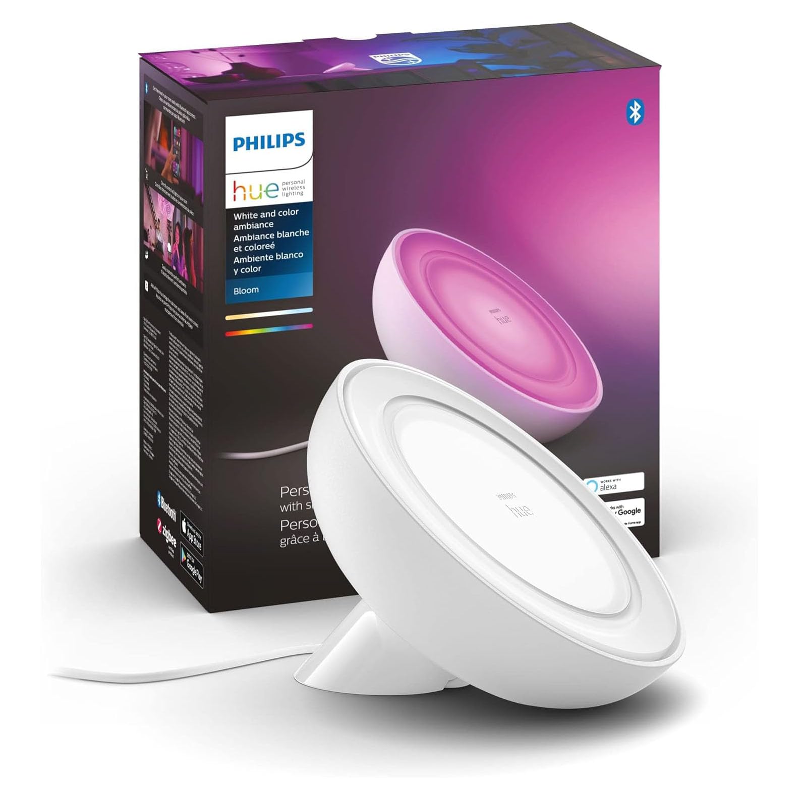 Philips Hue Bloom table lamp on table delivering indirect ambient lighting to highlight decor