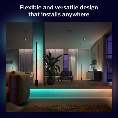 Philips Hue dynamic mood lighting with color shifts enhances living room ambience.
