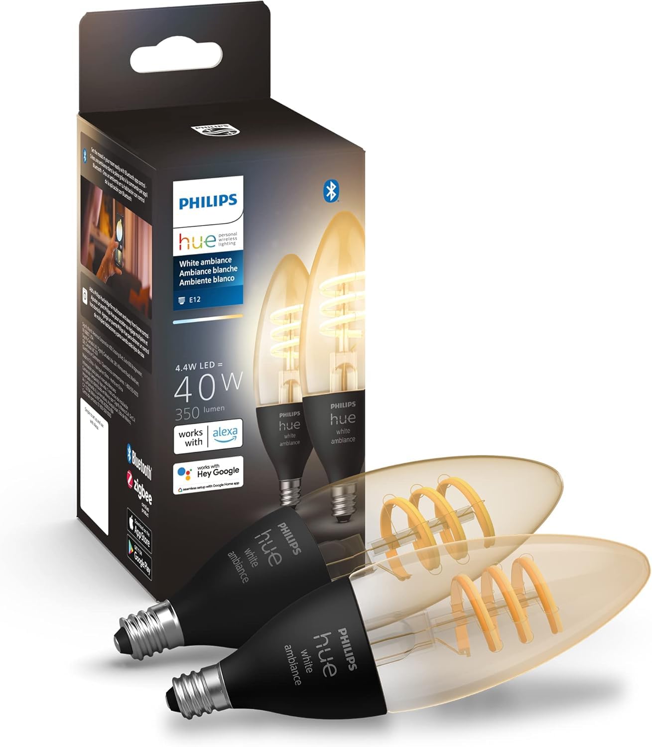 Philips Hue filament bulb glowing softly in a vintage fixture for warm ambiance.