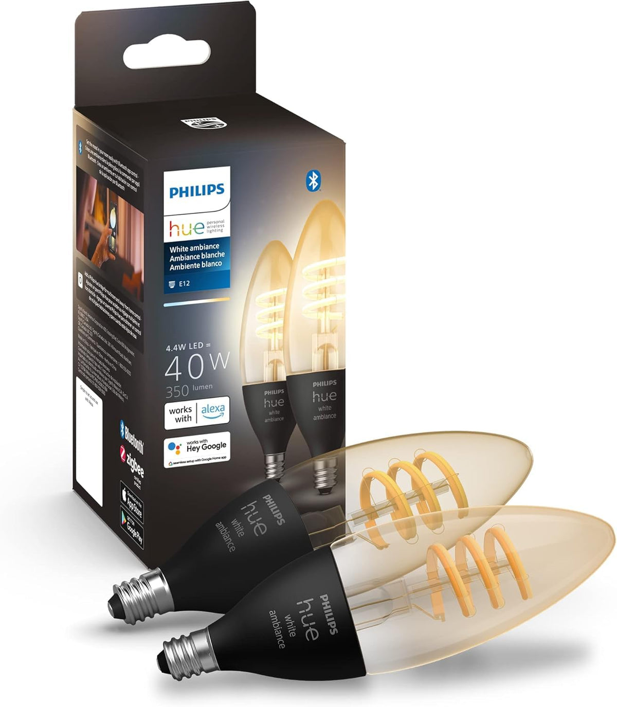 Philips Hue filament bulb glowing softly in a vintage fixture for warm ambiance.