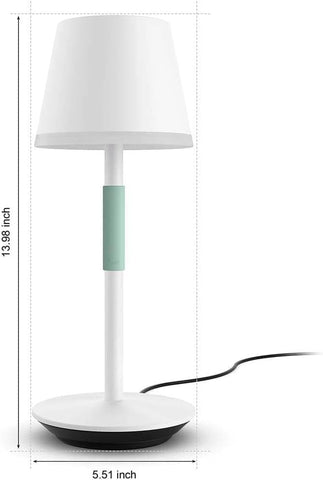 Philips Hue Go lamp on charging base ready for portable use