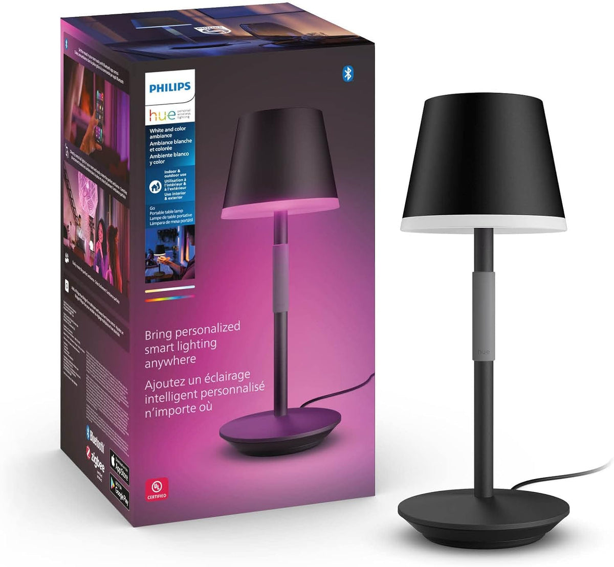 Philips Hue Go portable lamp in black on a table delivering mood lighting