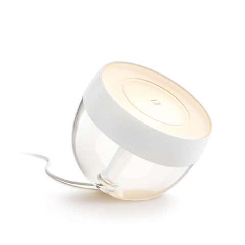 Philips Hue Iris wall wash of color brightens the room.