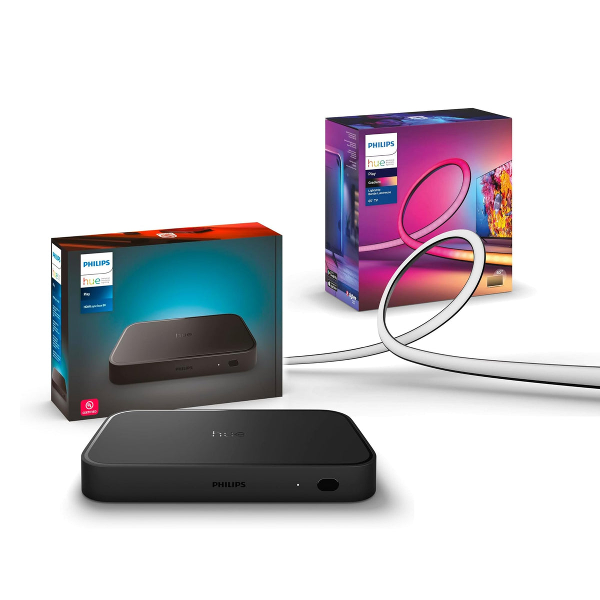 Philips Hue Play HDMI Sync Box 8K on setup desk, enabling immersive lighting sync