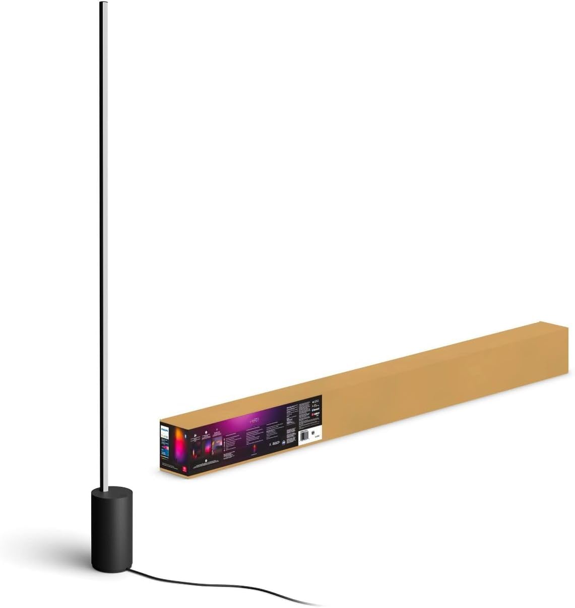 Philips Hue Signe gradient floor lamp in black, front view enhancing living room ambience