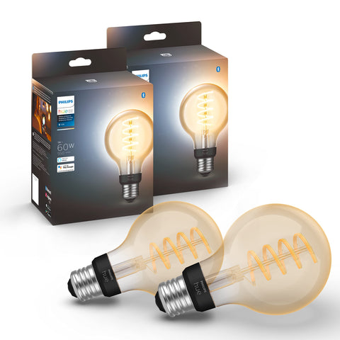 Philips Hue smart 60W G25 filament bulb in a fixture for warm-to-cool white light control.