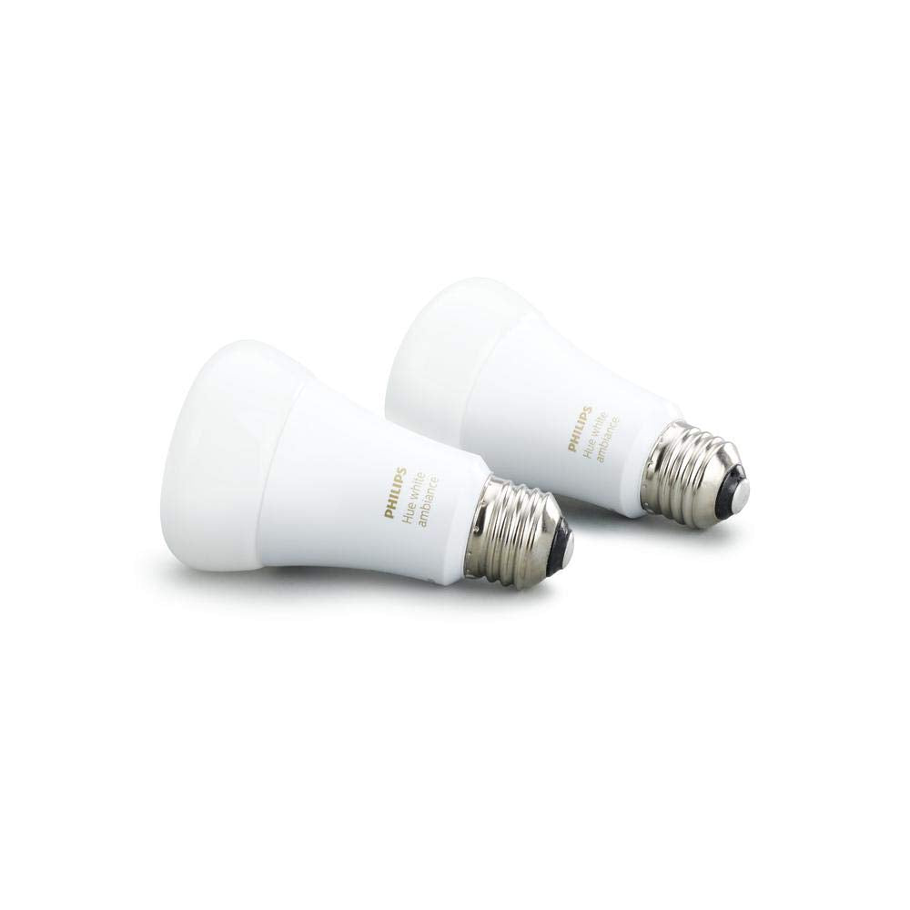 Philips Hue White Ambiance A19 bulbs shown for crisp daylight in a desk setup.