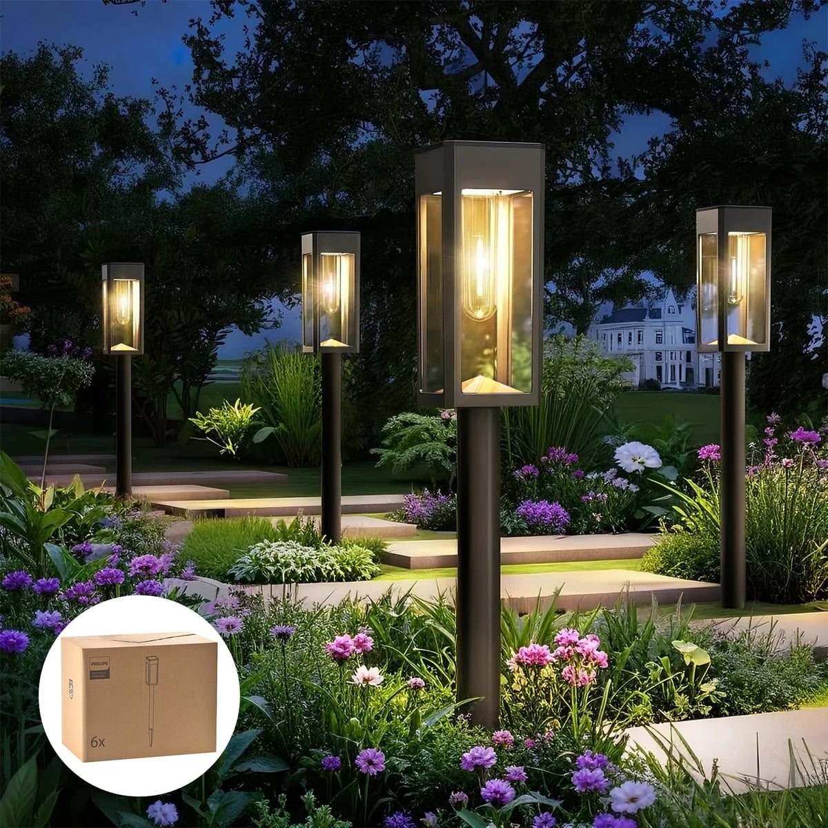 Philips solar pathway light in glass-metal design brightening a garden path