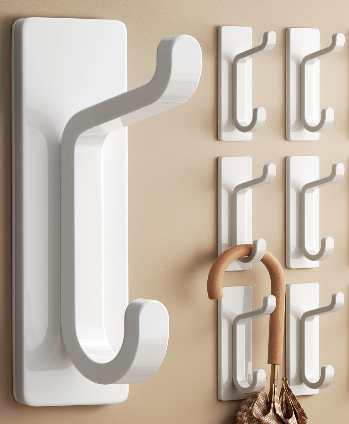 Pickpiff wall hooks in white securely hold coats and towels with 13 lb capacity.