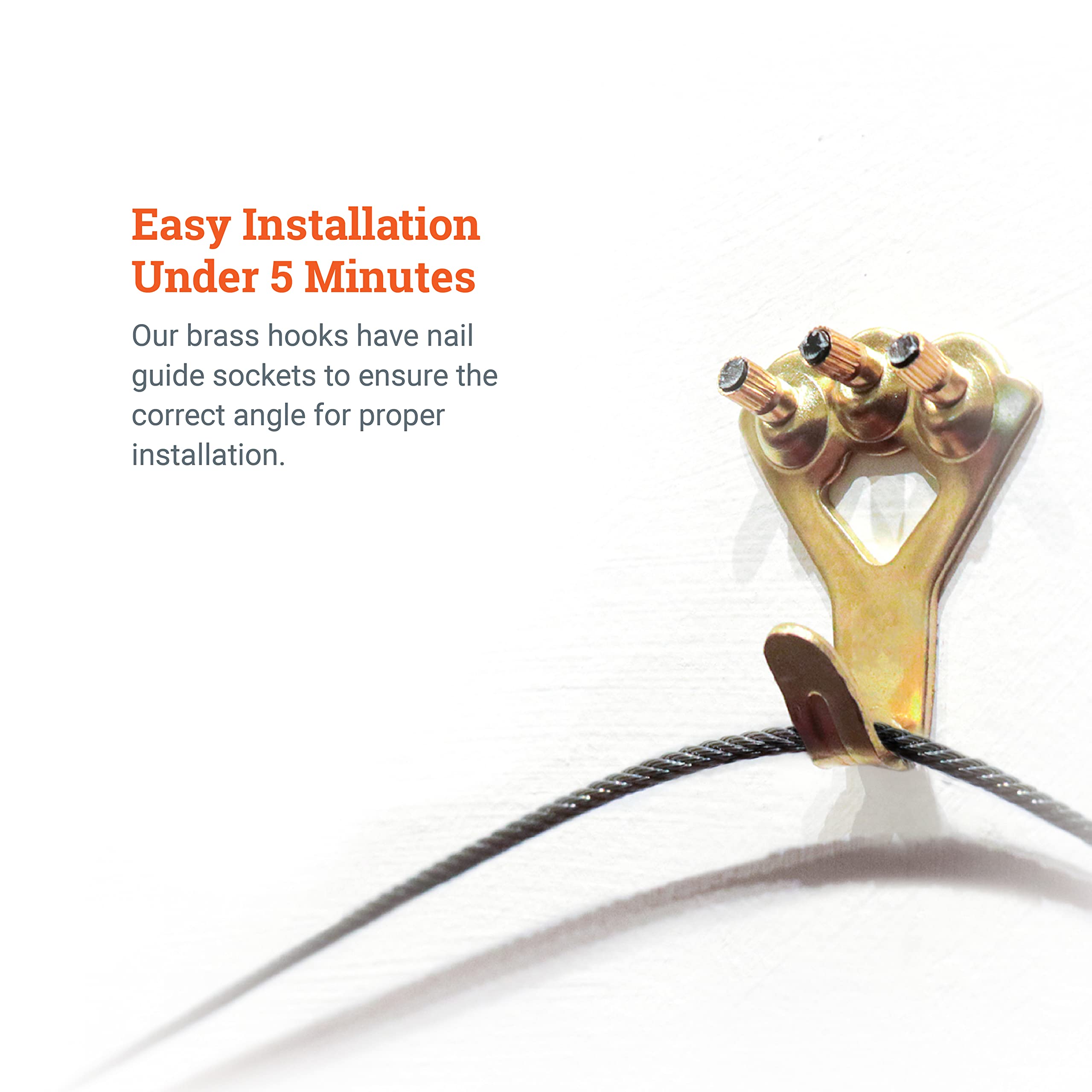 Picture Hang Solutions secure mount system shown with multiple frames on wall.