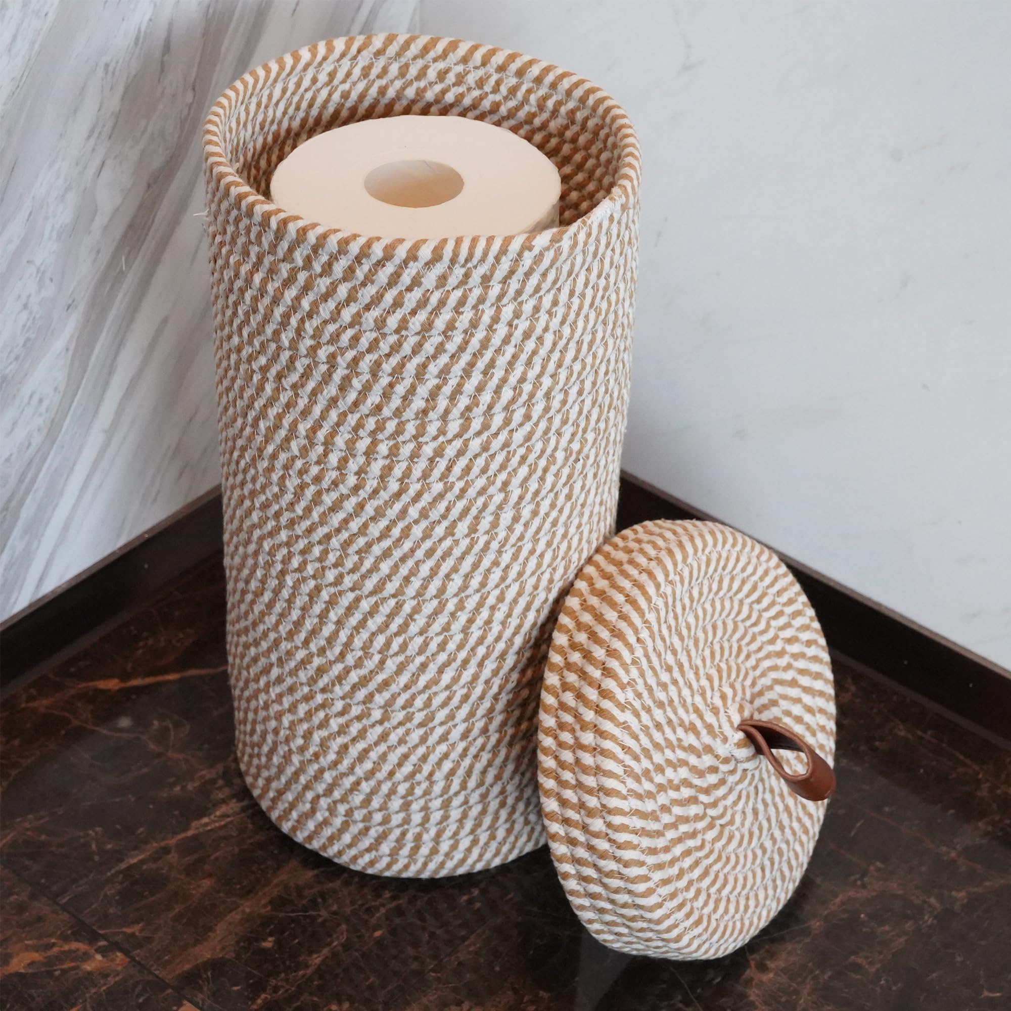 PINXIURY multipurpose bathroom basket blends boho and farmhouse styles while storing towels.