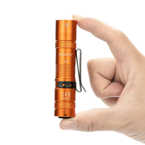 PIOOCAN Rechargeable flashlight with 1200-lumen front view for outdoor visibility.
