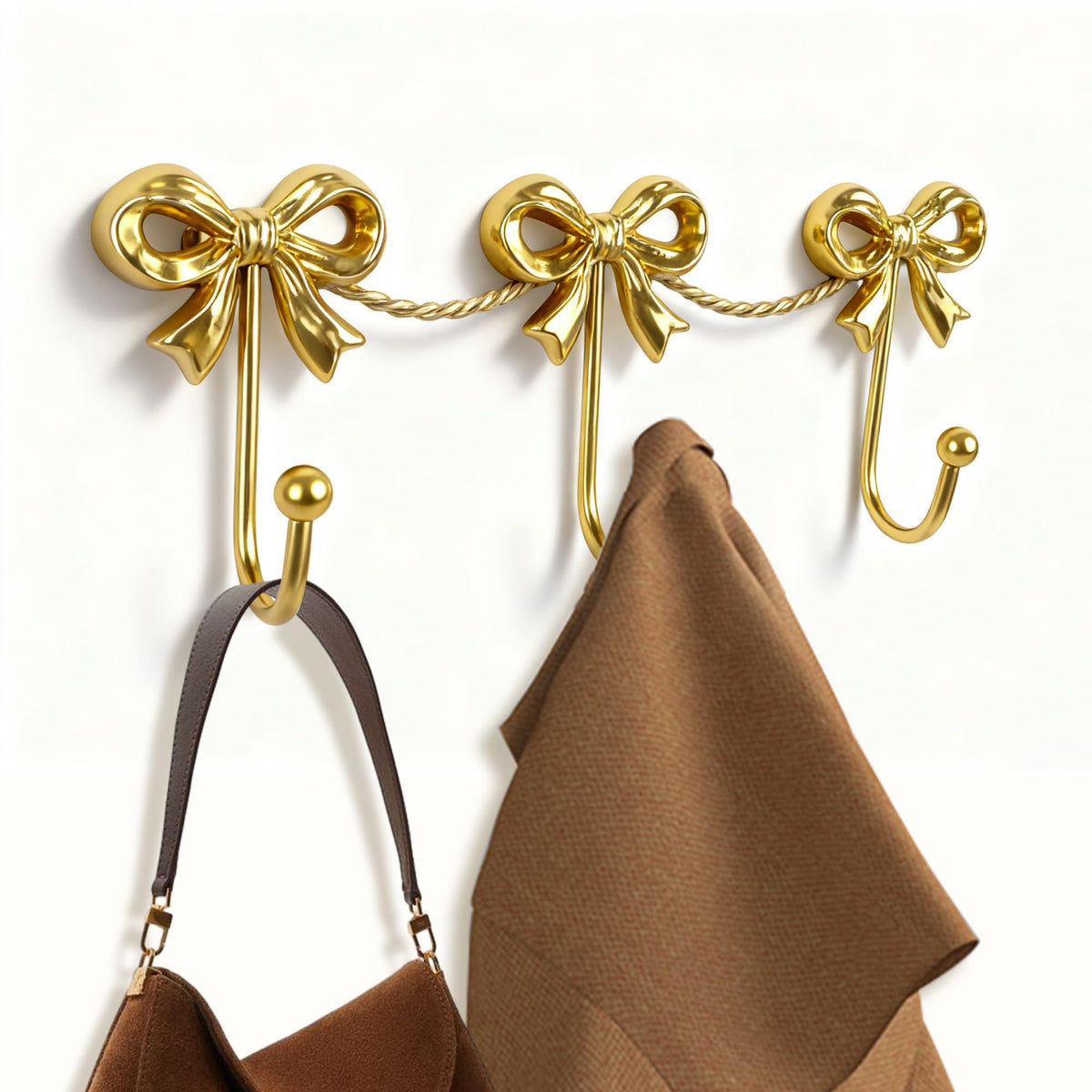Pipigaty gold bow hook on wall adding charm and practical storage