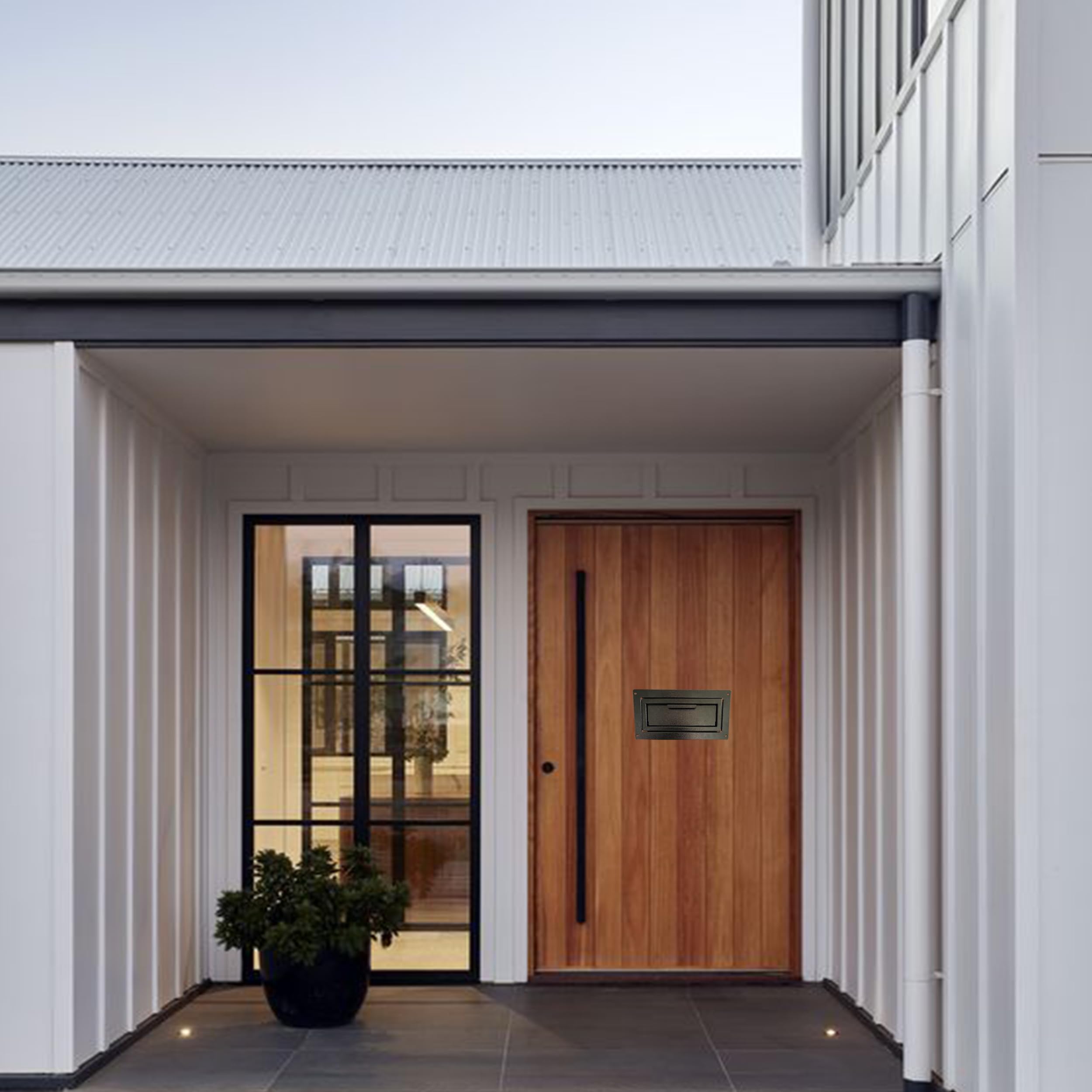 Plugsharge black exterior finish blends with exterior doors.