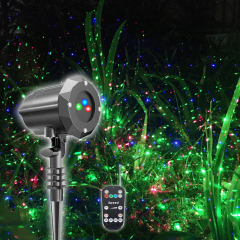 Poeland Christmas laser projector outdoors with vivid red, green, blue beams for festive yard display.