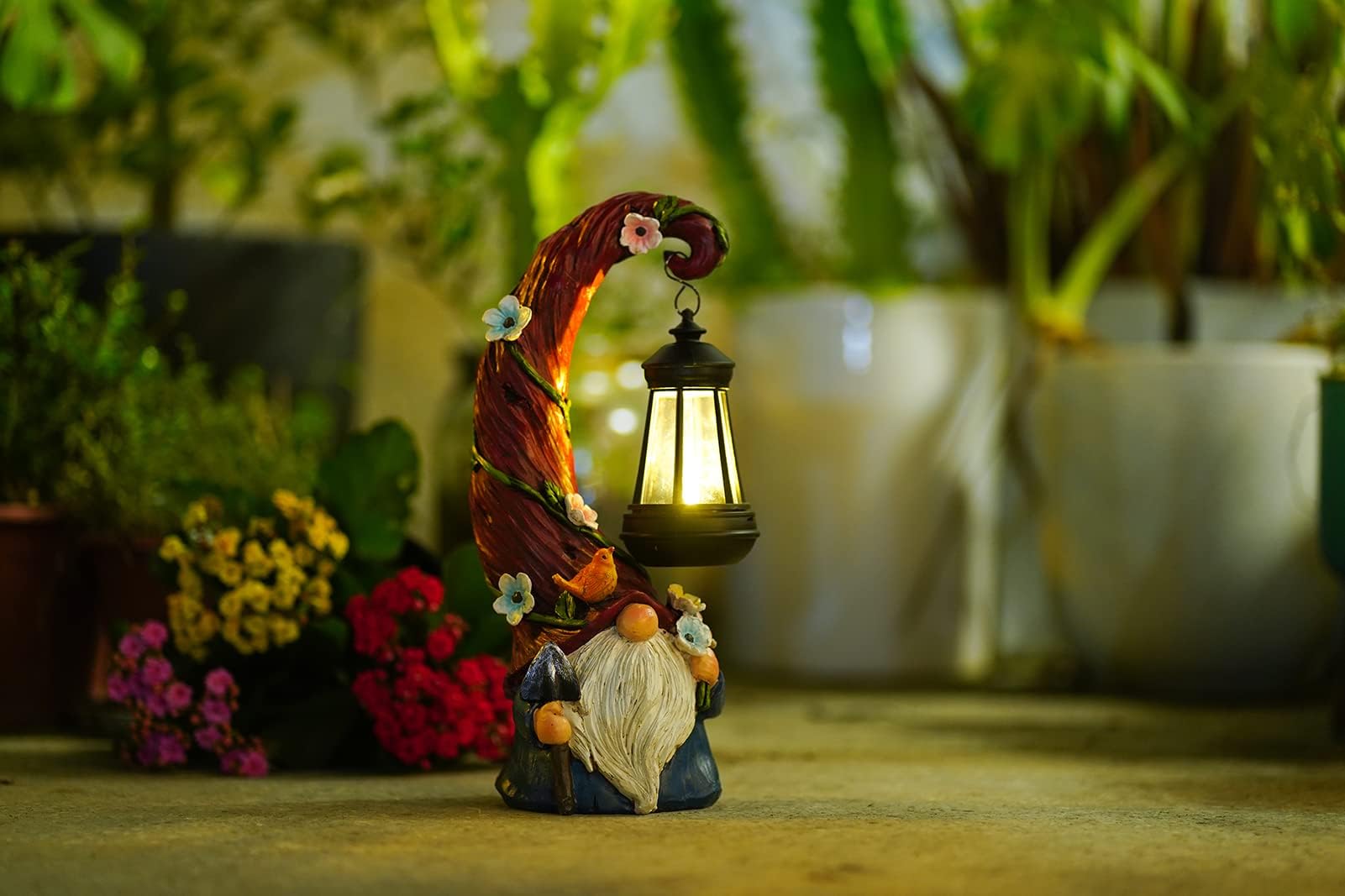 Pohabery Gnome Lantern Night Light casting warm light on pathway.