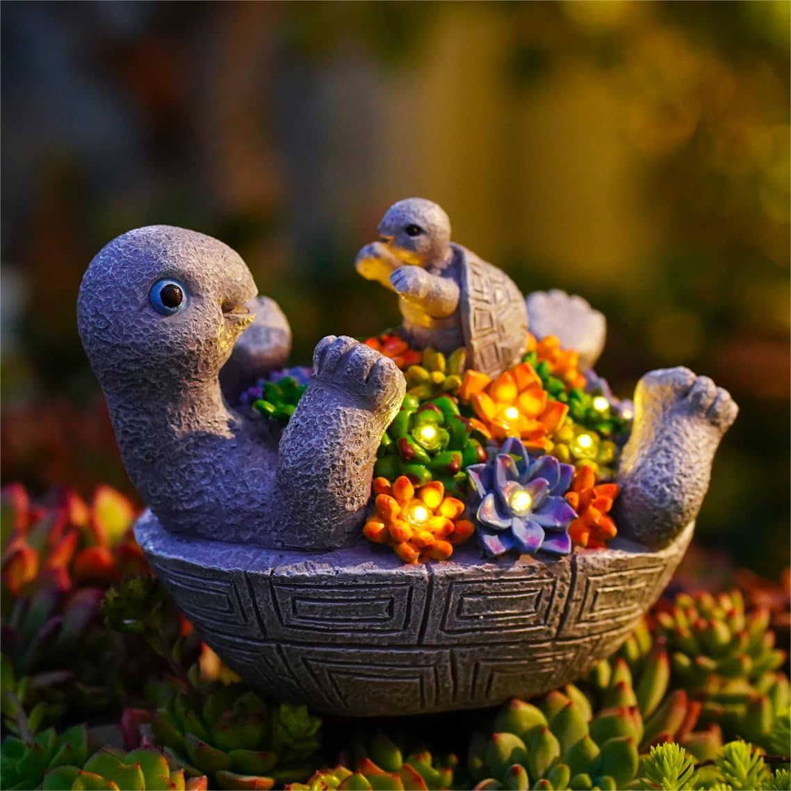 Pohabery solar turtle figurine glows softly in the garden at night.