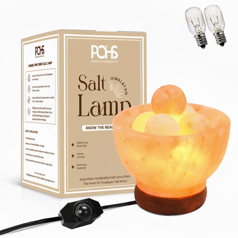 POHS Himalayan salt fire bowl with wooden base glows softly for a calming atmosphere.