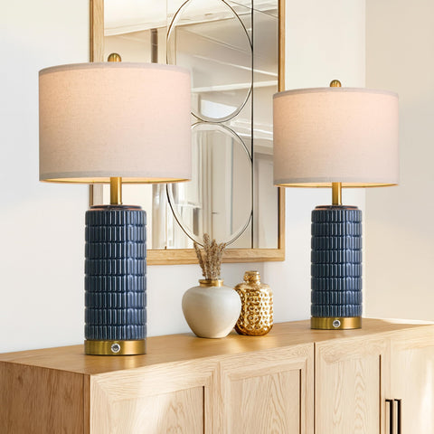 PoKat lamp with USB C and USB A ports charges devices at bedside